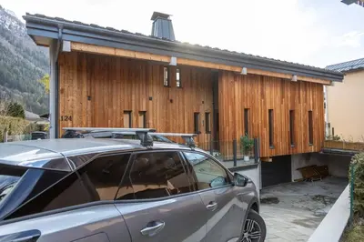 a car parked in front of a house at Chalet 124 in Chamonix-Mont-Blanc