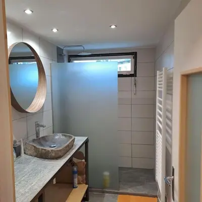 a bathroom with a sink and a mirror at Casa Peghera, Chamonix (hypercentre) in Chamonix-Mont-Blanc