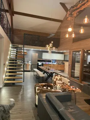 a living room with a couch and a table at Chalet Cristal II in Les Contamines-Montjoie