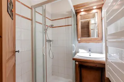 a bathroom with a shower and a sink at Les Grandes Jorasses - Calme - Duplex in Les Houches