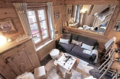 an overhead view of a living room with a couch at Duplex Chaleureux au Cœur de Megève 2 p in Megève