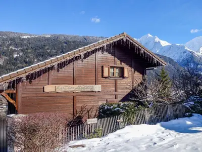 a view of a town in the mountains at Apartment Le clos Alpin by Interhome in Saint-Gervais-les-Bains