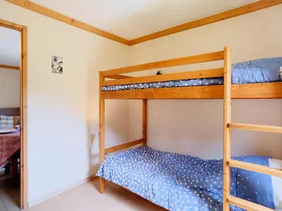 a bedroom with a bed in a room at Apartment Clos de la Fontaine 1 by Interhome in Saint-Gervais-les-Bains