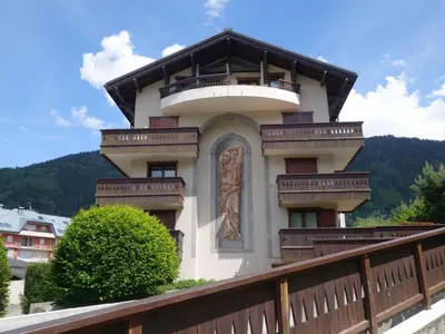 a building with snow on the ground in front of it at Apartment Jardins Alpins 2 by Interhome in Saint-Gervais-les-Bains