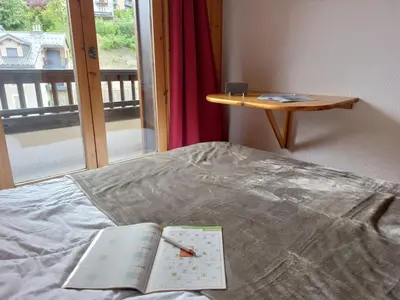 two stuffed animals are sitting in a bunk bed at Apartment Jardins Alpins 2 by Interhome in Saint-Gervais-les-Bains