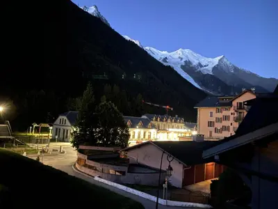 a small town with a mountain in the background at Résidence La Ginabelle - maeva Home - Appartement 3 pièces 6 personnes - Sélection MAE-2964 in Chamonix-Mont-Blanc