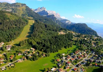 an aerial view of a village in the mountains at Village Club Les Tavaillons in Les Carroz d'Araches