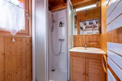a bathroom with a shower and a sink at Alpine Escape Facing the Aiguille du Midi in Chamonix-Mont-Blanc