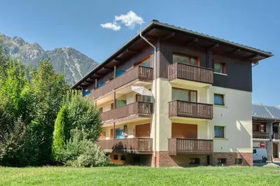 a building with balconies on the side of it at Barrats Studio - modern with Mont Blanc view in Chamonix-Mont-Blanc