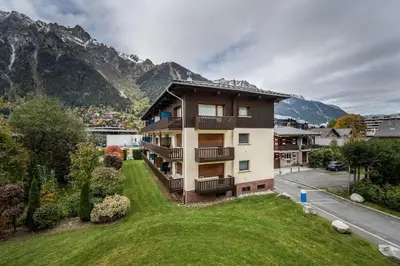 an aerial view of a building with mountains in the background at Barrats Studio - modern with Mont Blanc view in Chamonix-Mont-Blanc