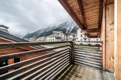 a balcony with a view of the mountains at Chalet Inari Chamonix - by EMERALD STAY in Chamonix-Mont-Blanc