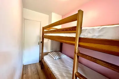a bunk bed room with two bunk beds in it at Le Refuge Diorama in Saint-Gervais-les-Bains