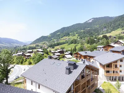 an aerial view of a village in the mountains at L'Altima Megève - Eclat des Veriaz in Megève