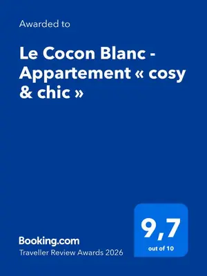 a screenshot of a cell phone with the words ice covenant blanca agreement cos at Le Cocon Blanc - Appartement « cosy & chic » in Megève