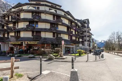 a large building on the side of a street at Le Balcon du Brevent - Central - Vue montagne in Chamonix-Mont-Blanc