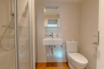 a bathroom with a toilet and a sink and a shower at Studio de Balme - Happy Rentals in Chamonix-Mont-Blanc