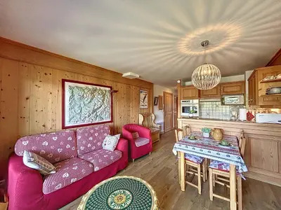 a living room with a couch and a table at Appartement 2 chambres avec parking et wifi à Combloux - FR-1-560-124 in Combloux