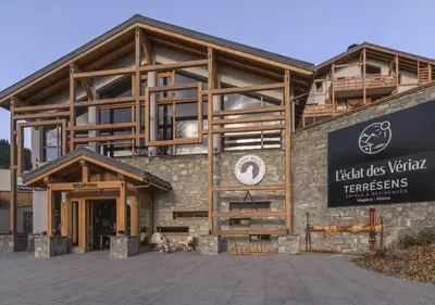 a building with a sign in front of it at Megève appartement 4 pièces résidence de standing in Megève