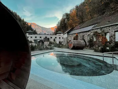 a large swimming pool in front of a building at Chalet Soleil Blanc au pied des pistes in Saint-Gervais-les-Bains