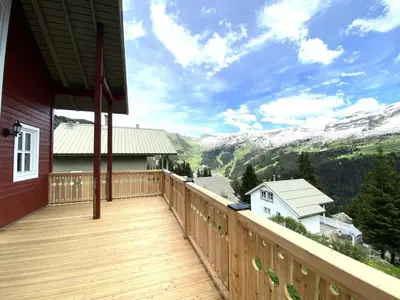 a balcony with a view of the mountains at Les Chalets de Flaine Hameau - maeva Home - Chalet 3 Pièces 8 Personnes - Confort MAE-3392 in Flaine