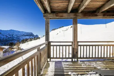 a view from the porch of a ski lodge in the snow at Résidence Refuge du Golf - maeva Home - Appartement 2 pièces 4 personnes Prestige MAE-3482 in Arâches-la-Frasse