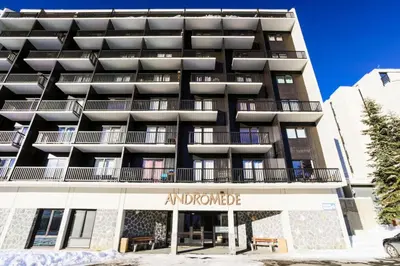 an apartment building with a sign that reads and admired at Résidence Andromède - maeva Home - Appartement 2 pièces 6 personnes Confort MAE-3514 in Flaine
