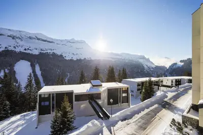 a house on top of a snow covered mountain at Résidence Andromède - maeva Home - Studio 4 personnes Confort MAE-3516 in Flaine
