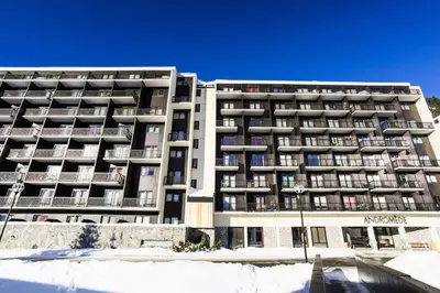 an apartment building with snow in front of it at Résidence Andromède - maeva Home - Studio 4 Personnes - Confort MAE-3649 in Flaine