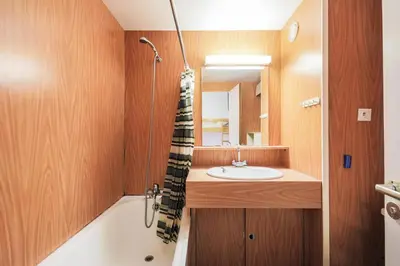a bathroom with a sink and a bath tub at Résidence Andromède - maeva Home - Studio 4 Personnes - Confort MAE-3650 in Flaine