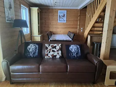 a living room with a couch and a table at Les Chalets de Flaine Hameau - maeva Home - Chalet 5 Pièces 8 Personnes - Confort MAE-3661 in Flaine