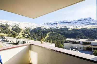 a view from the balcony of a building with snow covered mountains at Résidence Pégase - maeva Home - Appartement 3 Pièces 8 personnes - Sélection MAE-3663 in Flaine
