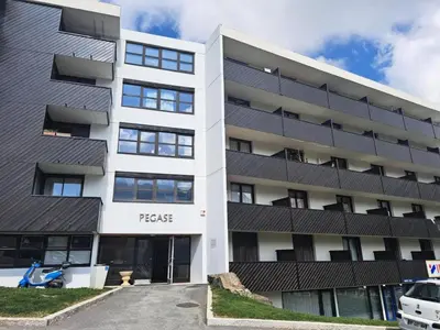 an office building with the press building at Résidence Pégase - maeva Home - Studio 4 Personnes - Budget MAE-3664 in Flaine