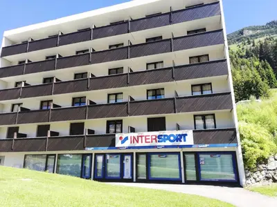 an apartment building with the entrance to an interview port at Résidence Pégase - maeva Home - Studio 4 Personnes - Budget MAE-3664 in Flaine