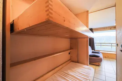 a room with a bunk bed in a house at Résidence Arche - maeva Home - Studio 4 Personnes - Confort MAE-3695 in Arâches-la-Frasse
