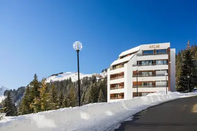 a building with a street light in the snow at Résidence Arche - maeva Home - Appartement 2 Pièces 6 Personnes - Confort MAE-3696 in Arâches-la-Frasse