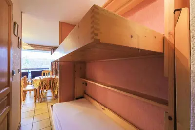 a room with a bed and a dining room at Résidence Arche - maeva Home - Studio 4 Personnes - Confort MAE-3697 in Arâches-la-Frasse