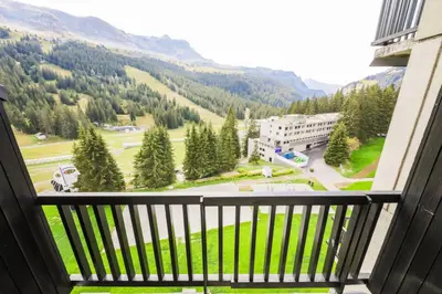 a balcony with a view of a mountain at Résidence Aldébaran - maeva Home - Appartement 2 Pièces 6 Personnes - Budget MAE-3792 in Arâches-la-Frasse