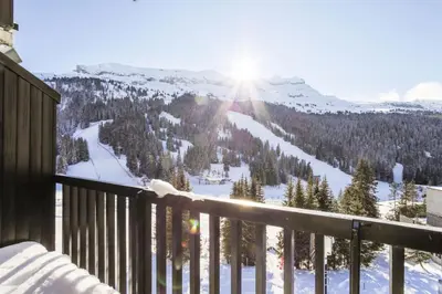 a view from a balcony of a snow covered mountain at Résidence Aldébaran - maeva Home - Appartement 2 Pièces 6 Personnes - Budget MAE-3792 in Arâches-la-Frasse