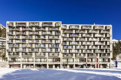 a building with snow in front of it at Résidence Aldébaran - maeva Home - Appartement 2 Pièces 6 Personnes - Budget MAE-3792 in Arâches-la-Frasse