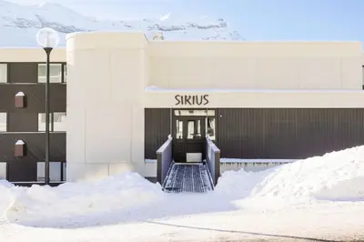 a building with snow in front of it at Résidence Sirius - maeva Home - Studio 4 Personnes - Confort MAE-3896 in Arâches-la-Frasse