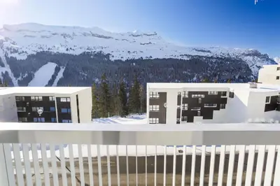 a view of the mountains from the balcony of a house at Résidence La Petite Ourse - maeva Home - Appartement 4 Pièces 6 Personnes - Sélection MAE-3904 in Arâches-la-Frasse