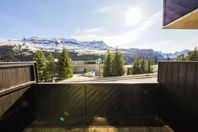 a balcony with a view of a snow covered mountain at Résidence Doris - maeva Home - Studio 4 Personnes - Confort MAE-3910 in Arâches-la-Frasse