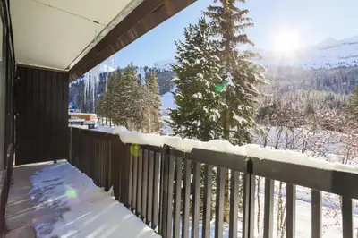 a balcony with a view of a snow covered tree at Résidence Eridan - maeva Home - Appartement 5 Pièces 10 Personnes - Confort MAE-3955 in Flaine