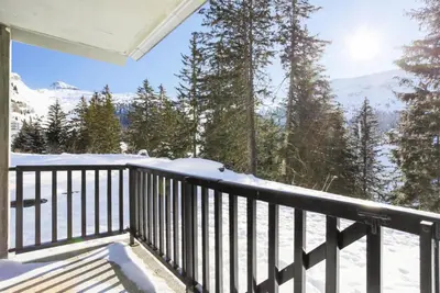a balcony with a view of the snow covered mountains at Résidence Pollux - maeva Home - Appartement 2 pièces 6 personnes - Budget MAE-4210 in Arâches-la-Frasse