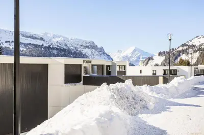 a pile of snow in front of a building at Résidence Pollux - maeva Home - Studio 4 personnes - Budget MAE-4213 in Arâches-la-Frasse
