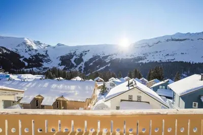 a snow covered town with mountains in the background at Résidence Le Château de Crans - maeva Home - Studio 4 personnes - Confort MAE-4250 in Flaine