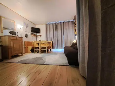 a living room with a couch and a table at Résidence Véga - maeva Home - Studio 4 Personnes - Budget MAE-4467 in Arâches-la-Frasse