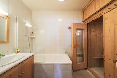 a bathroom with a sink and a bath tub at Résidence Le Château de Crans - maeva Home - Appartement 3 Pièces 8 Personnes - Confort MAE-4488 in Flaine