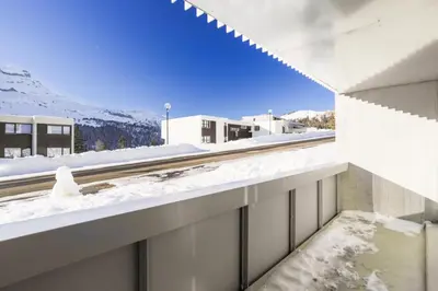 a view from a balcony of a building in the snow at Résidence La Petite Ourse - maeva Home - Studio 3 Personnes - Sélection MAE-4901 in Arâches-la-Frasse