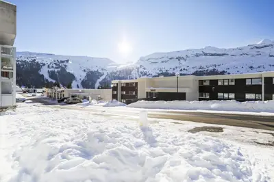 a pile of snow in front of a building at Résidence La Petite Ourse - maeva Home - Studio 3 Personnes - Sélection MAE-4901 in Arâches-la-Frasse